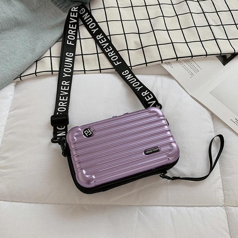 Resväska-inspirerad crossbody-väska