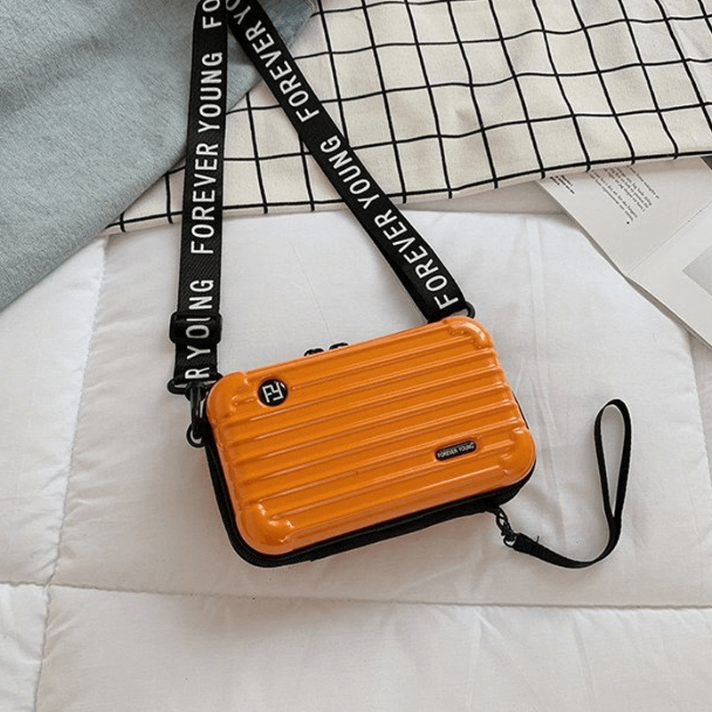 Resväska-inspirerad crossbody-väska