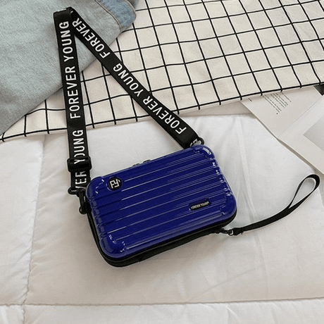 Resväska-inspirerad crossbody-väska