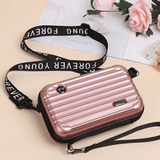 Resväska-inspirerad crossbody-väska